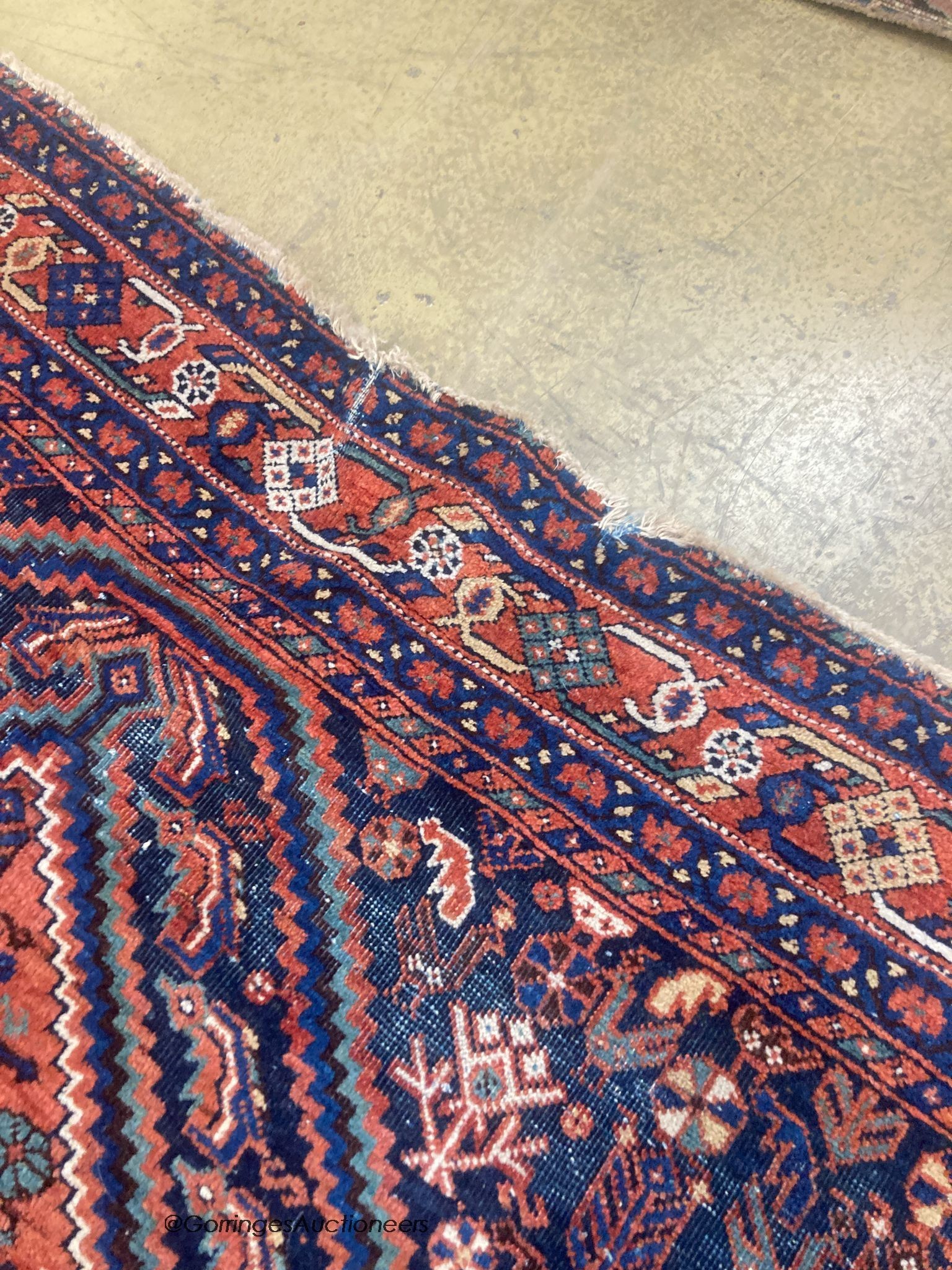 A Caucasian blue ground rug, 188 x 154cm